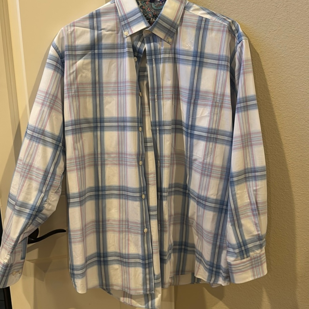 Blue plaid button down shirt.